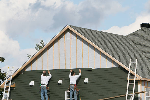 Professional Siding technician working in Unionville, CT